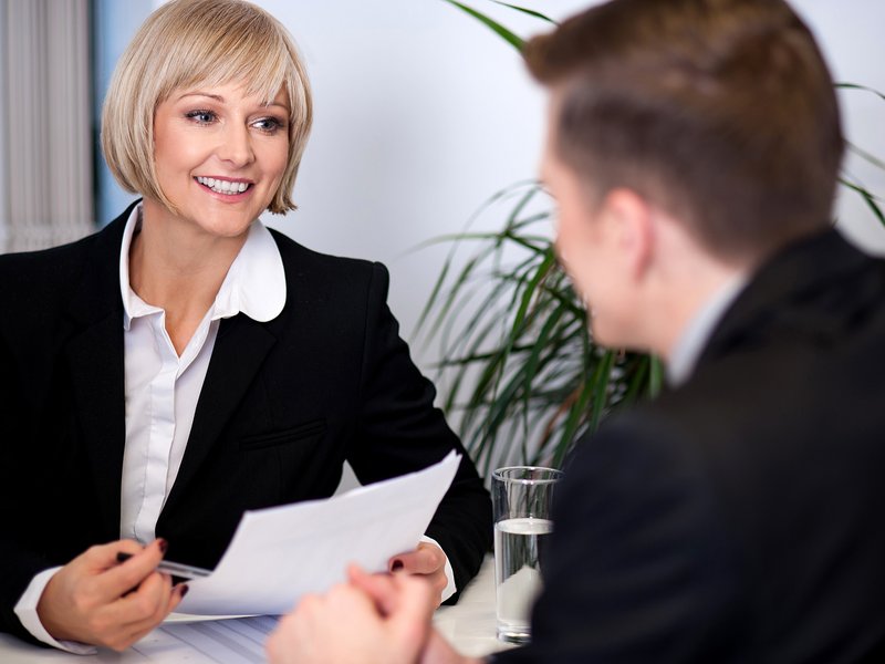 Director discussion with a colleague